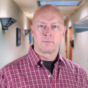 Hubert Jacobs Unsmiling bald man